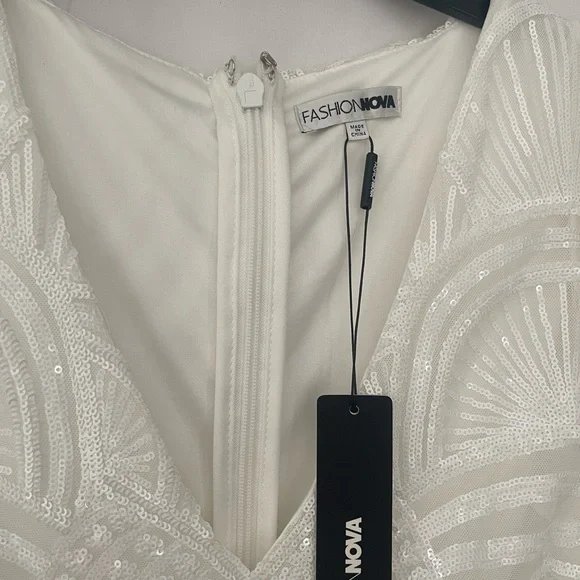 Fashion Nova Ivory Beaded V-Neck Wedding Gown with Feather Shoulders - Picture 5 of 9